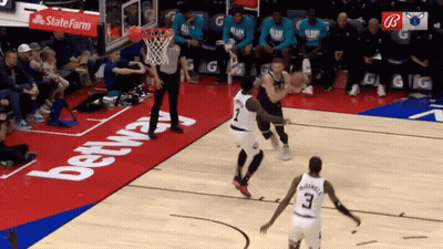 Basketball Game In Front Of State Farm Ad GIF