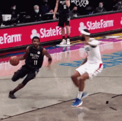 Basketball Game In Front Of State Farm Sign GIF