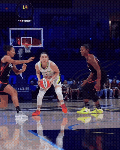 Basketball Game In Front Of Tissot Advertisement GIF