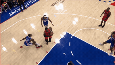 Basketball Game In Front Of Wells Fargo Banner GIF