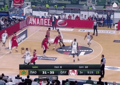 Basketball Game In Stadium With Ocomote Banner GIF