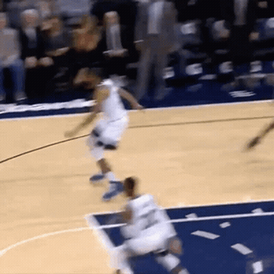 Basketball Game On Court With Blue Stripe GIF