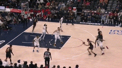 Basketball Game On Court With Capitol Sign GIF
