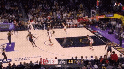 Basketball Game On Court With Crowd Watching GIF