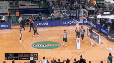 Basketball Game On Court With Green Lord Logo GIF