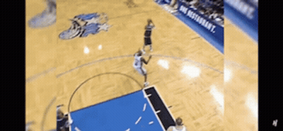 Basketball Game On Court With Orlando Magic Logo GIF