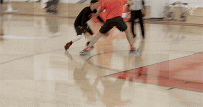Basketball Game On Court With Spalding Sign GIF