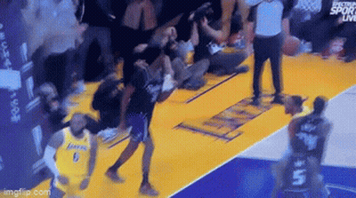 Basketball Game On Court With Spectators GIF