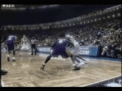 Basketball Game With Com Banner In Stadium GIF