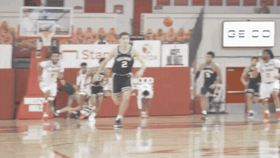 Basketball Game With Geico Sign