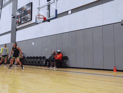 Basketball Game With Scoreboard Showing 5:00 GIF