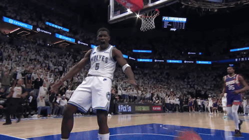 Basketball Player Celebrating Dunk In Wolves Jersey GIF
