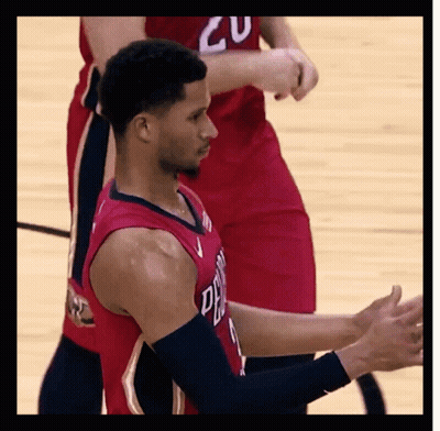 Basketball Player Clapping With Red Jersey Number 20 GIF