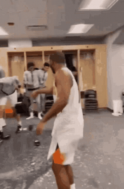 Basketball Player Dancing In Locker Room GIF