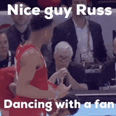 Basketball Player Dancing With Fan In Crowd GIF