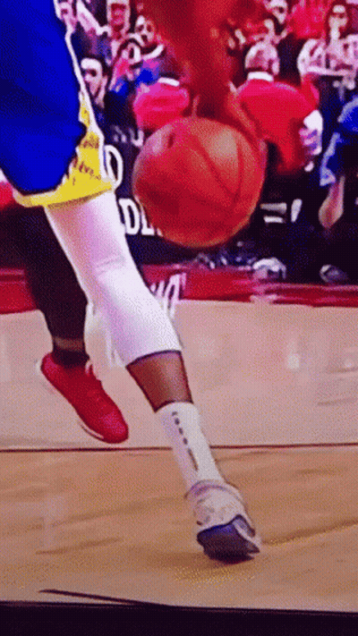 Basketball Player Dribbling Ball With Crowd GIF
