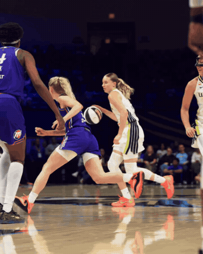 Basketball Player Dribbling In Jersey Number 4 GIF