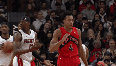 Basketball Player Dribbling In Red Raptors Jersey GIF