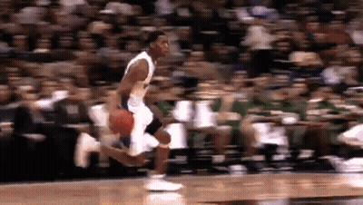 Basketball Player Dribbling On Court GIF