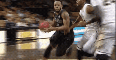 Basketball Player Dribbling Past Defender GIF