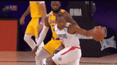 Basketball Player Dribbling While Another Watches GIF