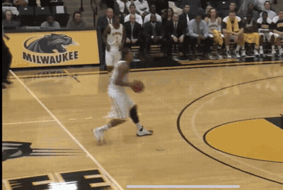 Basketball Player Dribbling With Milwaukee Banner GIF