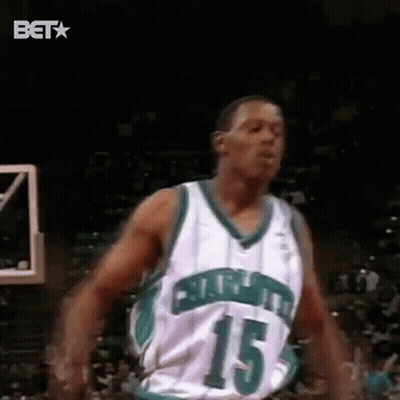 Basketball Player Green And White Number 15 Jumping GIF
