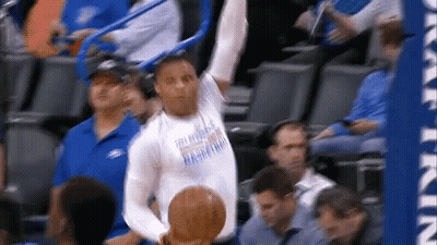 Basketball Player Holding Ball In Front Of Crowd GIF
