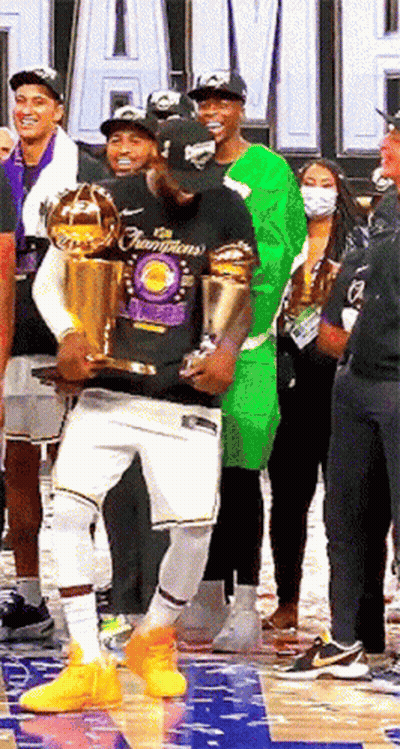 Basketball Player Holding Champions Trophy GIF