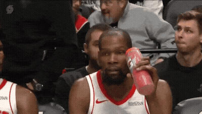 Basketball Player Holding Gatorade Bottle GIF