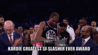 Basketball Player Holding Kardie Trophy GIF