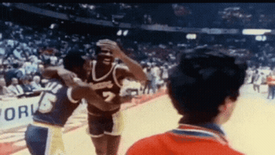 Basketball Player Hugging Number 7 GIF