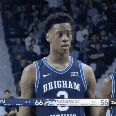Basketball Player In Blue Jersey 3 In Front Of Crowd GIF