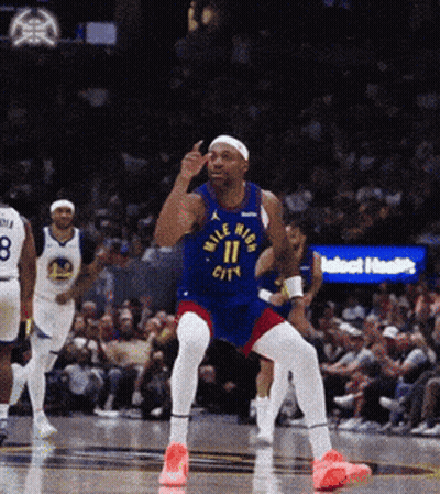 Basketball Player In Blue Jersey Saying Mile High City GIF