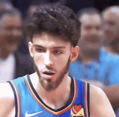 Basketball Player In Blue Jersey With Heart GIF