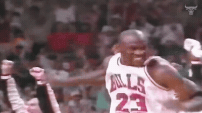 Basketball Player In Bulls Jersey Arms In Air GIF