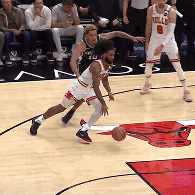 Basketball Player In Bulls Jersey Dribbling GIF