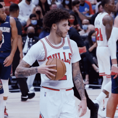 Basketball Player In Bulls Jersey Holding Ball GIF