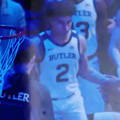Basketball Player In Butler Jersey Standing In Front Of Hoop GIF