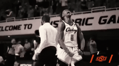 Basketball Player In Cowboys Jersey Celebrating With Teammates GIF