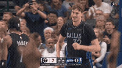 Basketball Player In Dallas Jersey In Front Of Crowd GIF