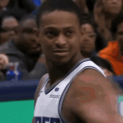 Basketball Player In Denver Jersey Looking At Camera GIF