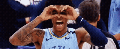 Basketball Player In FedEx Jersey Looking Through Hands GIF