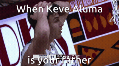 Basketball Player In Front Of North Main Street Sign GIF