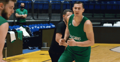 Basketball Player In Green Algiris Jersey Dribbling GIF