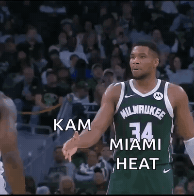 Basketball Player In Green Jersey Number 34 In Front Of Crowd GIF