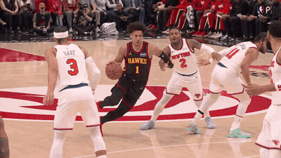 Basketball Player In Hawks Jersey Dribbling GIF
