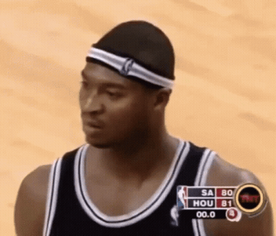 Basketball Player In Headband Looking At Scoreboard GIF