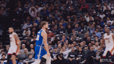 Basketball Player In Heat Jersey Blocking Opponent GIF
