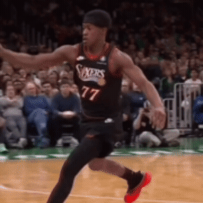 Basketball Player In Jersey Number 77 GIF